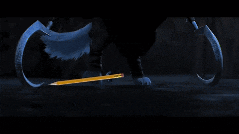 A seal swimming and forming a circle with it's body.